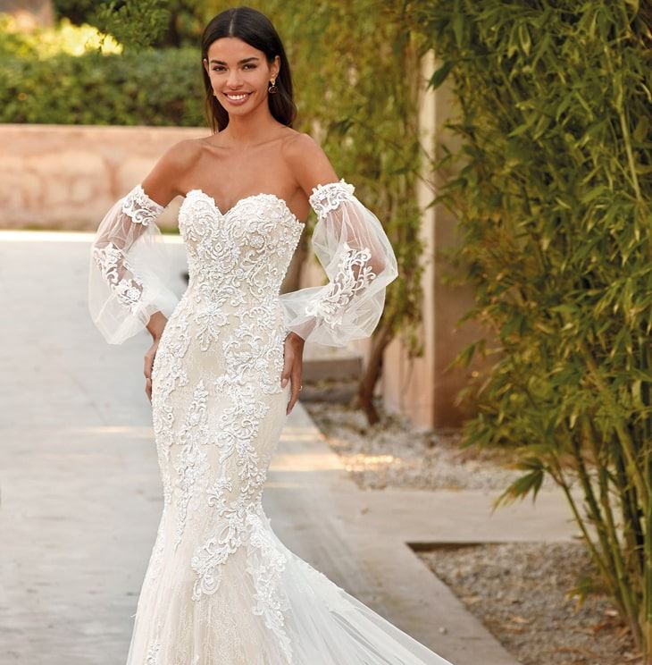 Model wearing white wedding dress